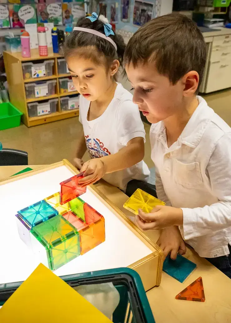Students working with blocks