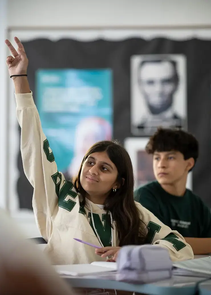Student raising her hand